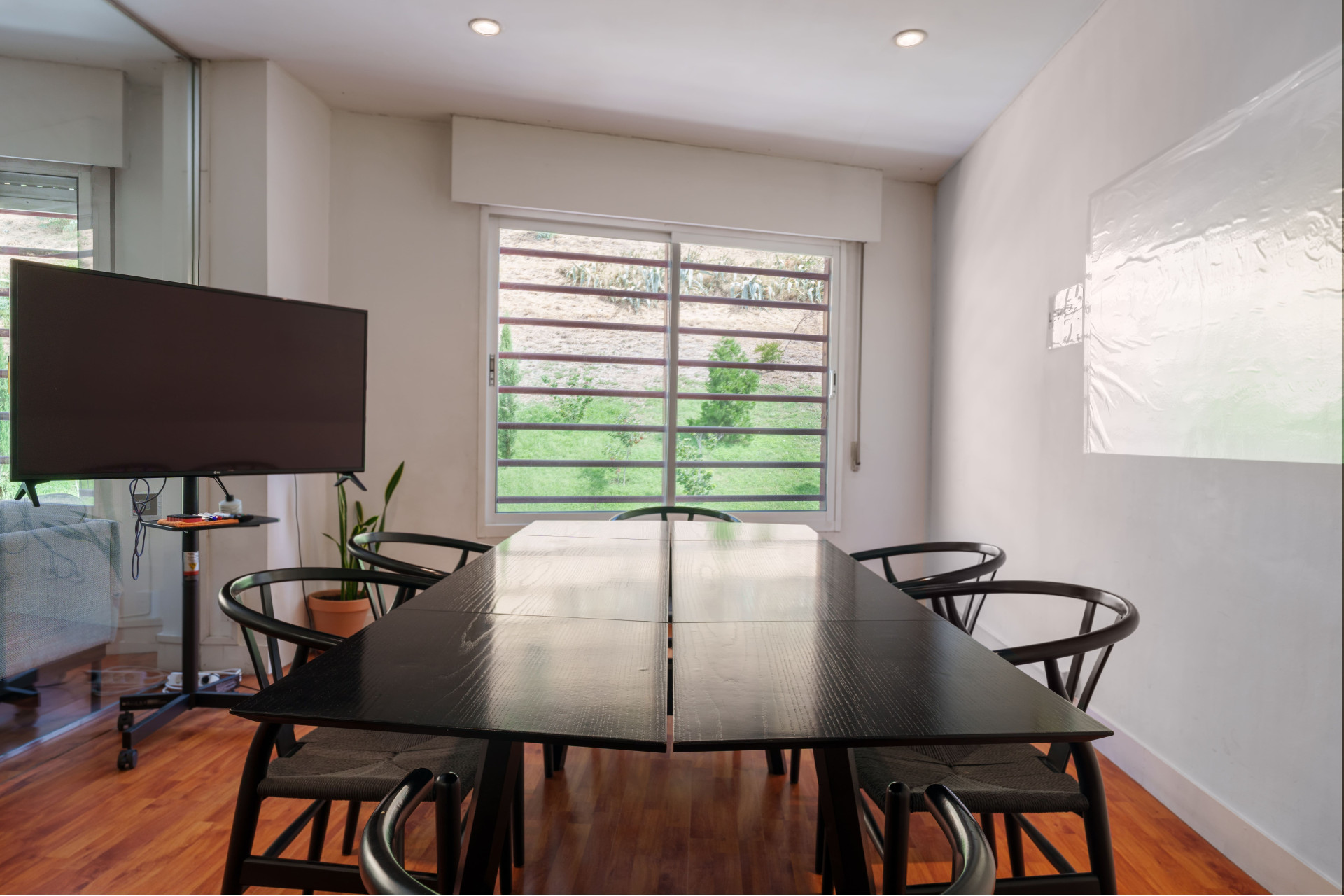 Meeting Room 8-12p | TV + Natural Light + Glazed walls | Coffee included